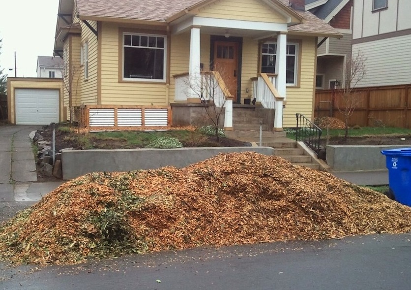 Wood chips in front of house